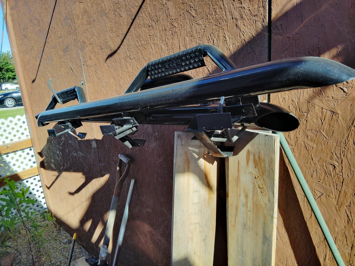Black metal rack slightly worn needs cleaning